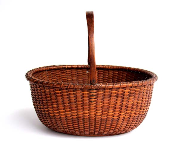 An Exceptional late 19th century Oval Nantucket Swing Handle Basket — image 2